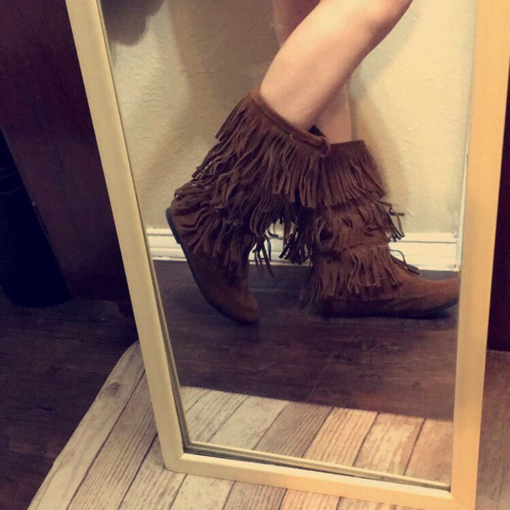 Brown frayed boots